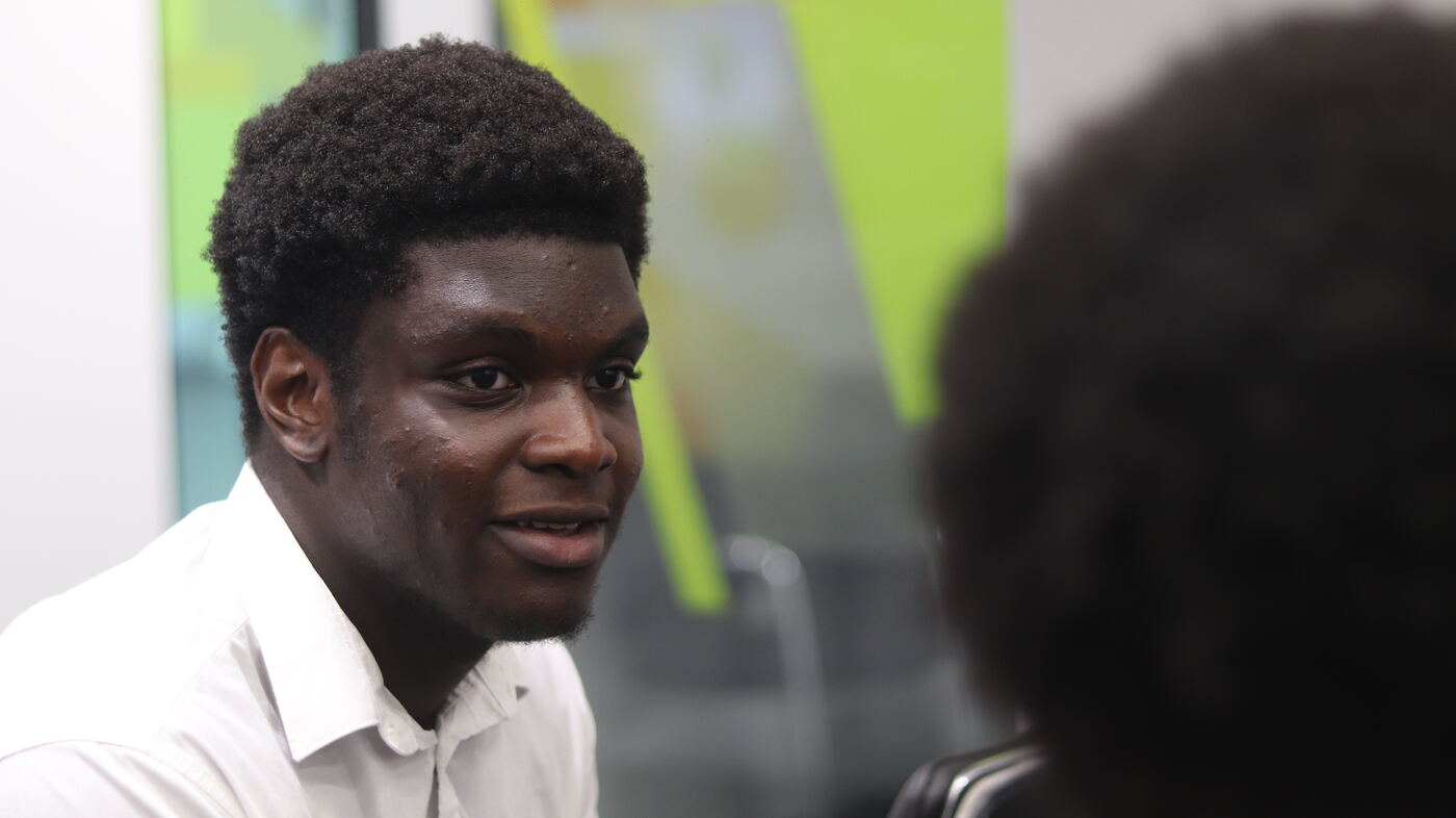 A student speaking at a NetworKING UK event