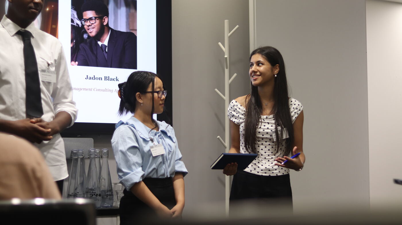 Students presenting at a NetworKING UK event